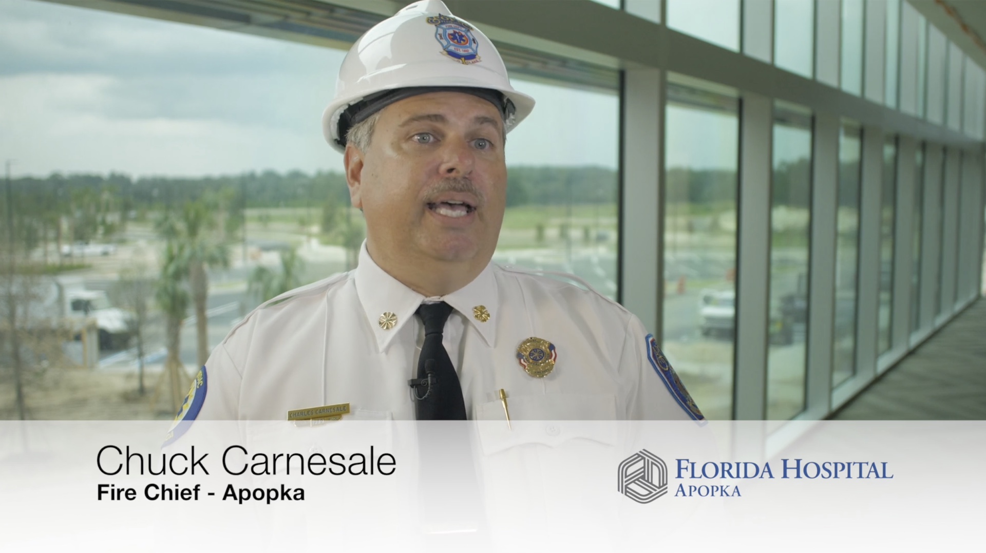 Interview frame identifying Chuck Carnesale in the original film as Apopka Fire Chief.
